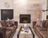 Facing Sofas, Gas Fireplace, Taupe Marble Fireplace, Cable Stair Railing, Pocket Doors