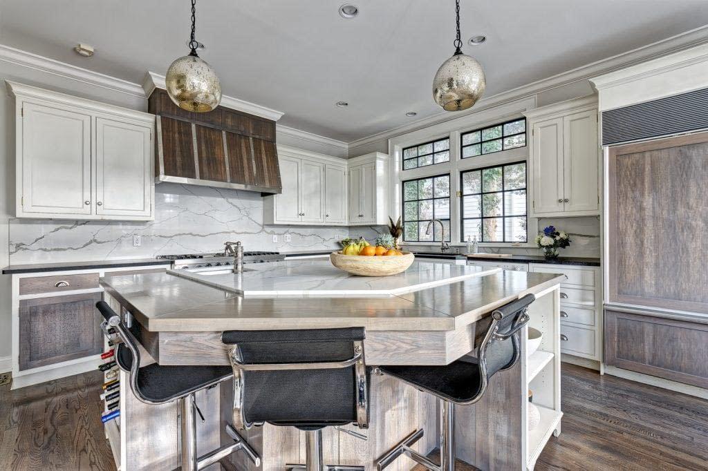 Custom Wood Work, Quartz Backsplash and island, Heathered Absolute Black Granite Perimeter Countertop, Hickory Perimeter Island Countertop, Sunpan Barstools, Black Painted Mullions, Riverside, Greenwich